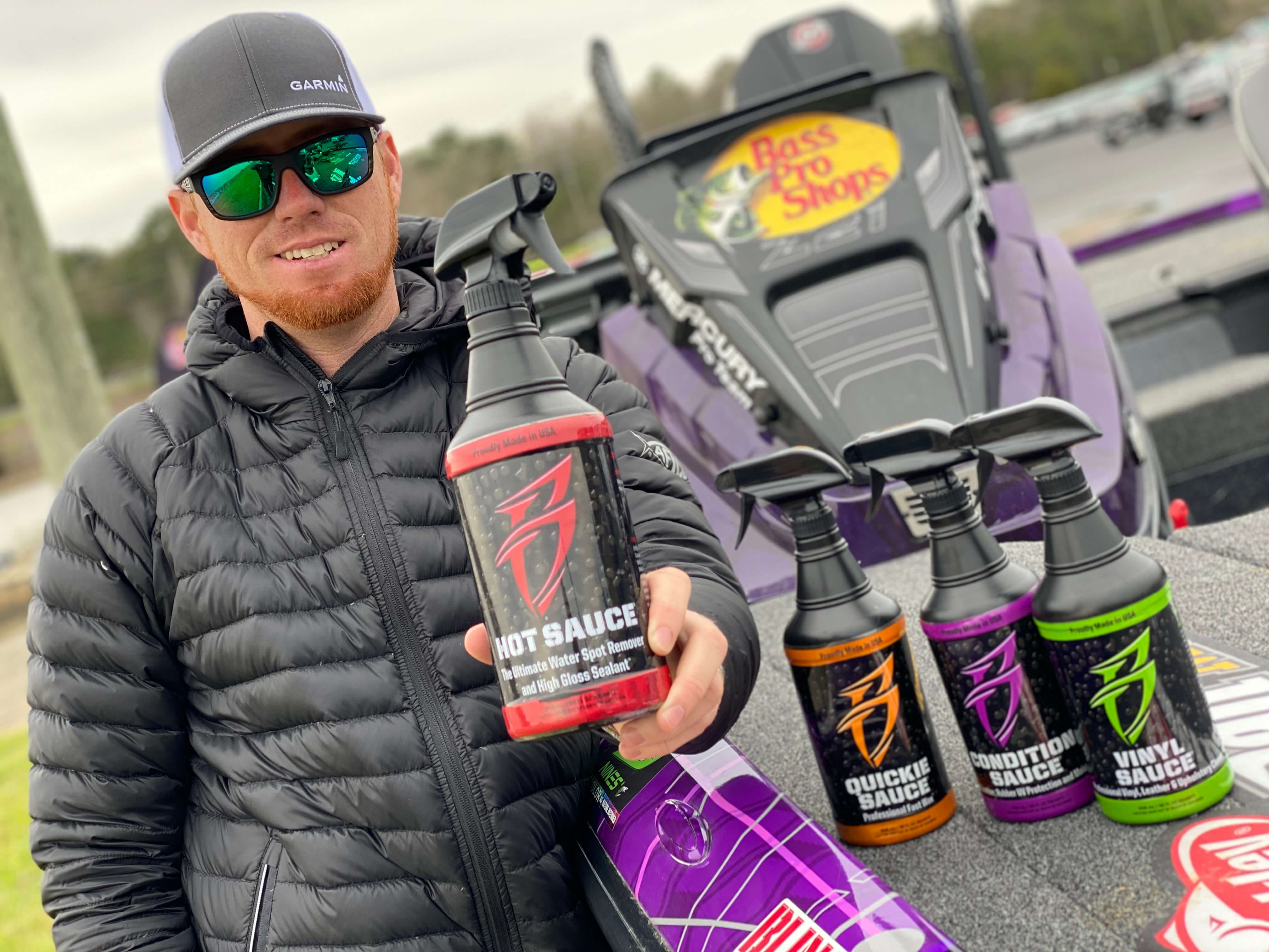 Josh Bertrand with Bling Sauce products
