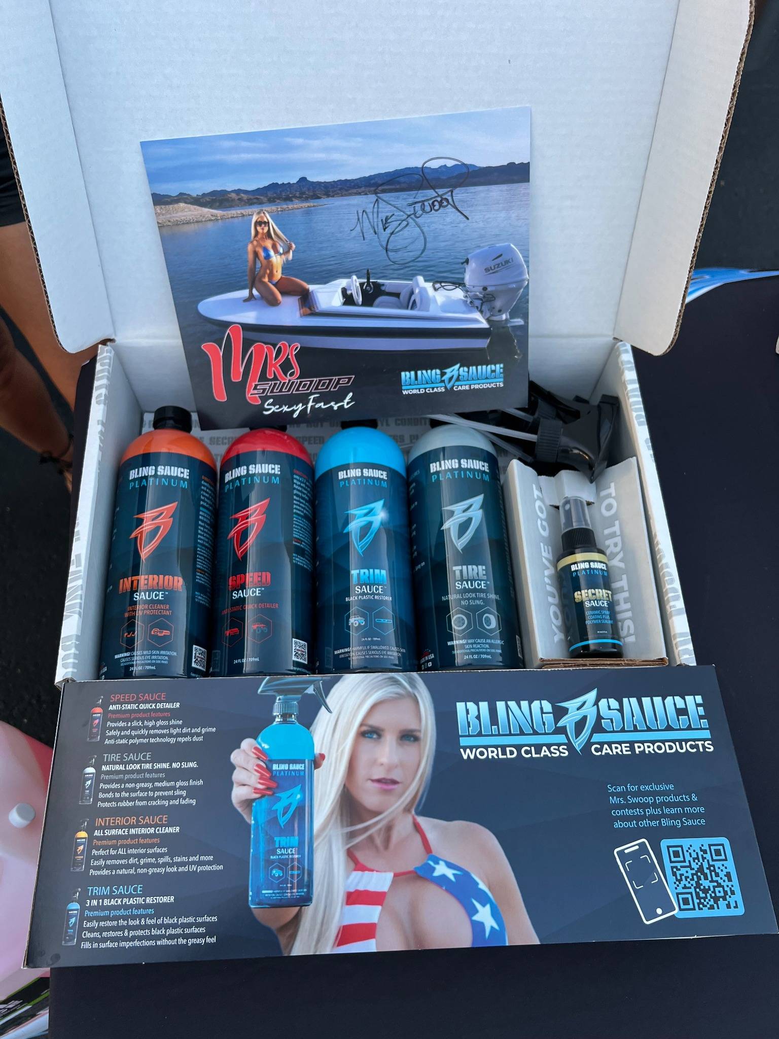 Mrs. Swoop’s SEXYFAST Kit displayed in a box, featuring various Bling Sauce products and a promotional photo.