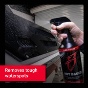 A person sprays Hot Sauce on a vehicle surface, effectively removing tough water spots for a glossy finish.