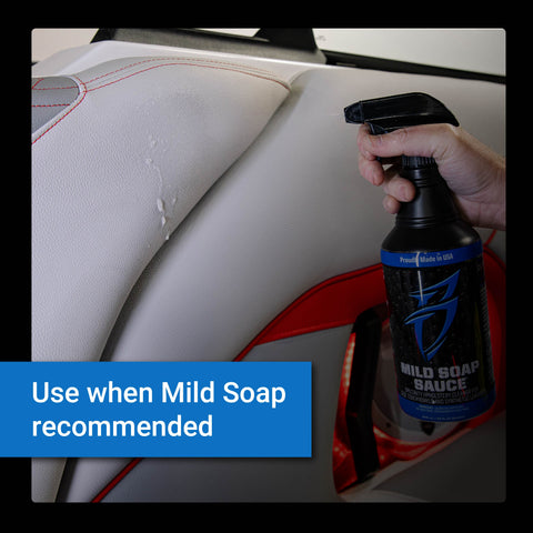 Mild Soap Sauce bottle held next to a car interior, highlighting its use for cleaning surfaces safely and effectively.