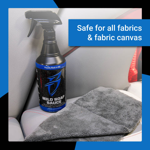 Mild Soap Sauce bottle next to a soft microfiber towel on a car seat, designed for safe cleaning of all fabrics.