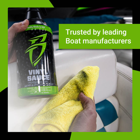 Vinyl Sauce bottle held next to a microfiber cloth, showcasing premium cleaning for vinyl surfaces in boats and vehicles.
