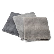 Three grey-shade microfiber towels in varying tones, ideal for cleaning and detailing vehicles for a professional finish.