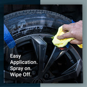 Tire Sauce application process showing a hand spraying product on a tire and wiping it with a microfiber cloth.