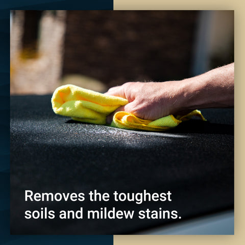Hand using a microfiber cloth to clean a vehicle surface, effectively removing tough soils and mildew stains.
