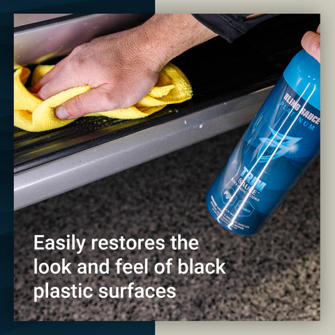 Hand applying Trim Sauce to restore black plastic surfaces, showcasing its effectiveness for vehicle detailing.